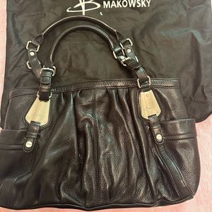 B. Makowsky Large Black Leather Shoulder Bag with zipper and grommet accents